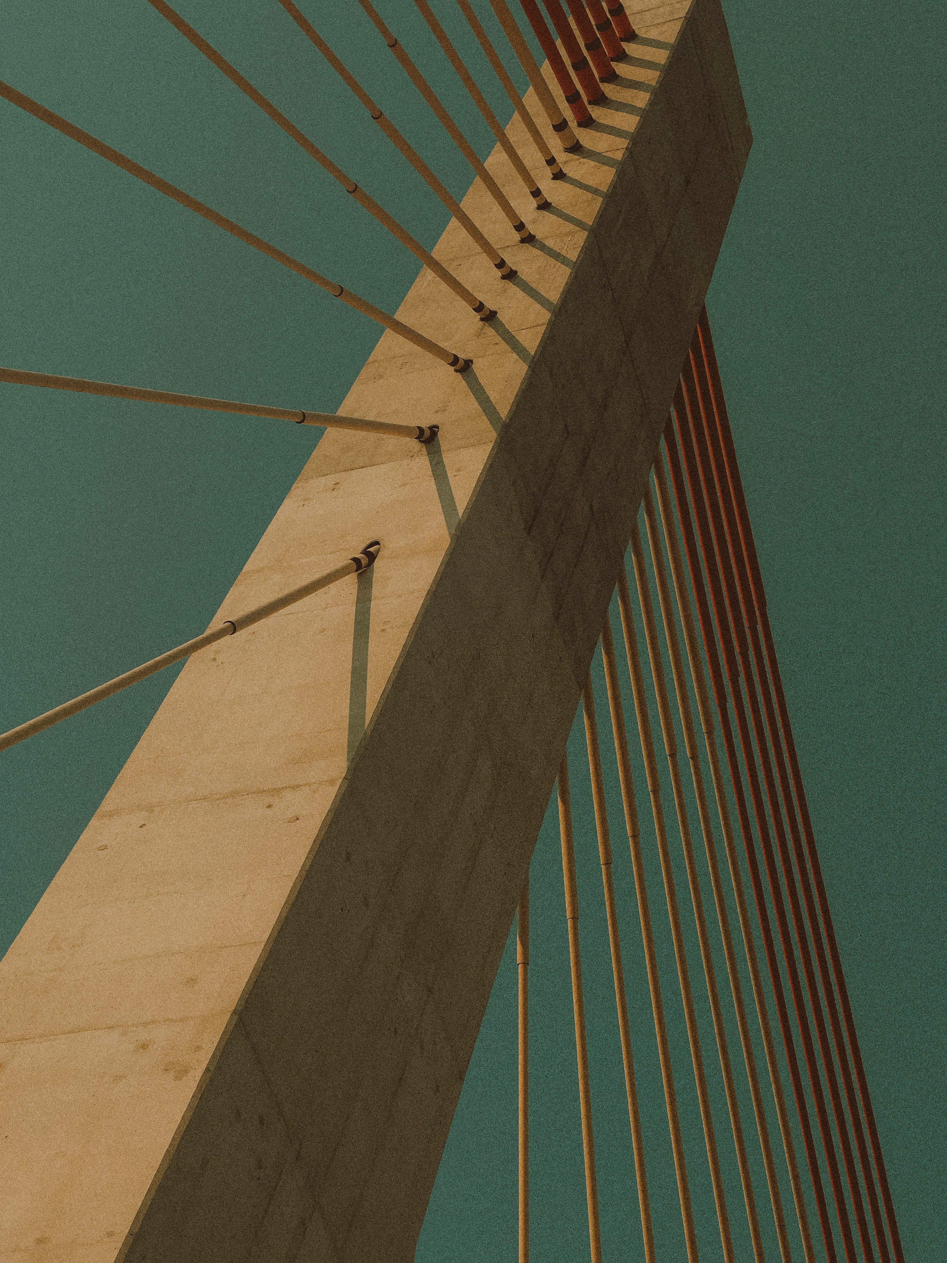 brown bridge under blue sky during daytime